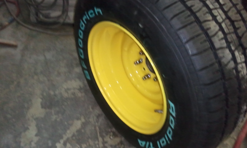 New rear wheel and tire. Wheel painted Bright Ford Yellow which the complete truck will be painted.